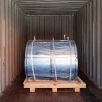 Steel cylinder in container
